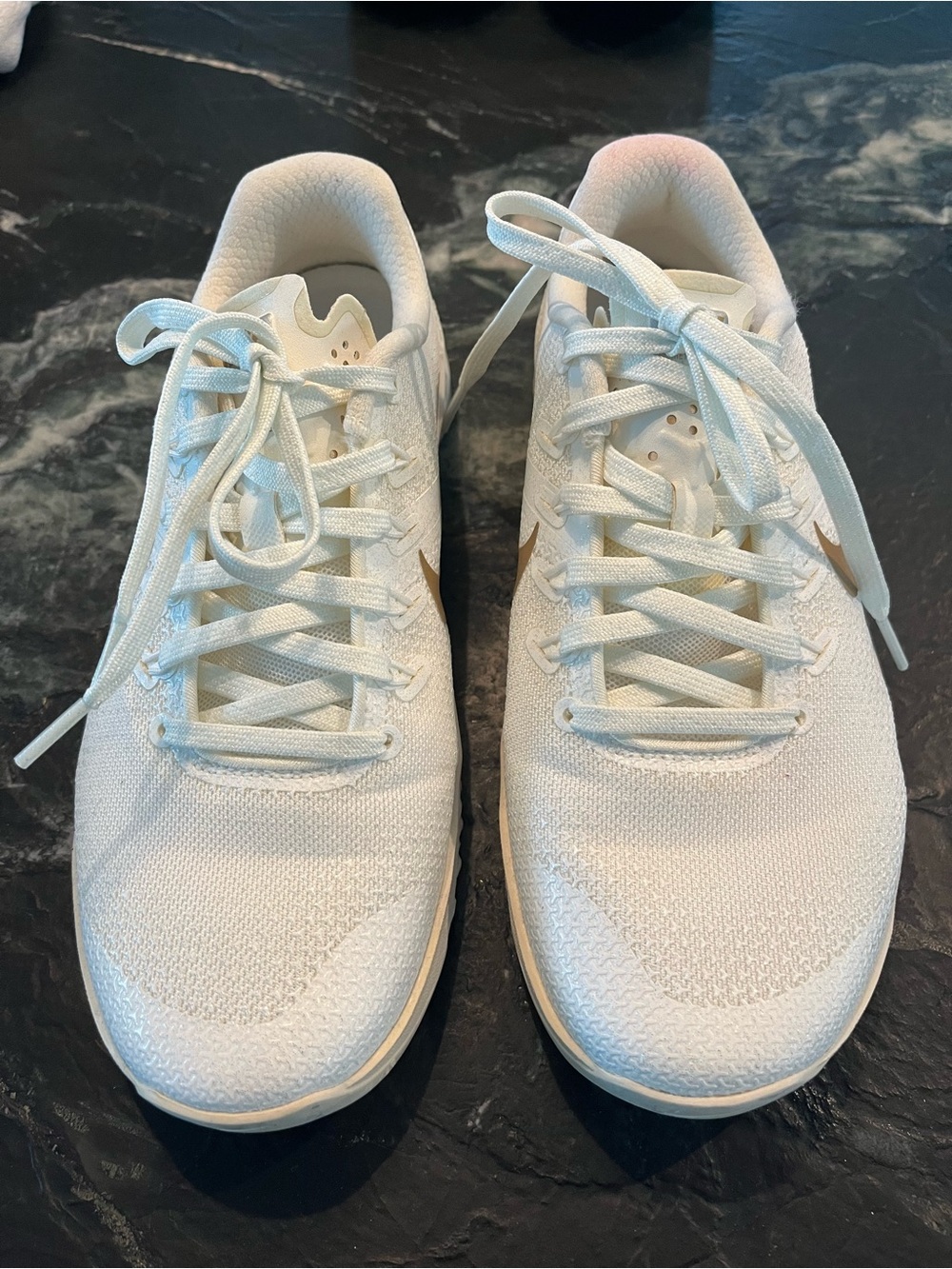 Nike Women's White Sneakers with Subtle Gold Swoosh